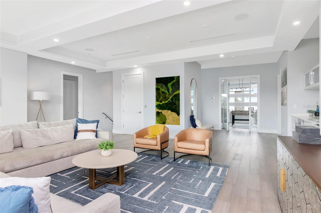 4936 West San Rafael Street Tampa, FL 33629 - Photo 27 of 42 a living room with furniture and wooden floor