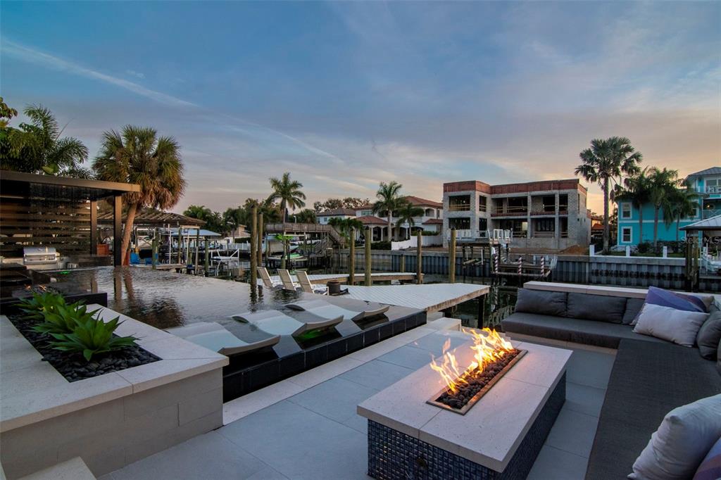 4936 West San Rafael Street Tampa, FL 33629 - Photo 31 of 42 a living room with patio furniture and a potted plant