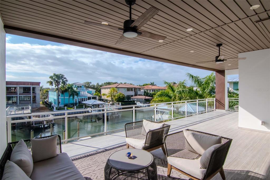 4936 West San Rafael Street Tampa, FL 33629 - Photo 41 of 42 a patio with glass top table and chairs