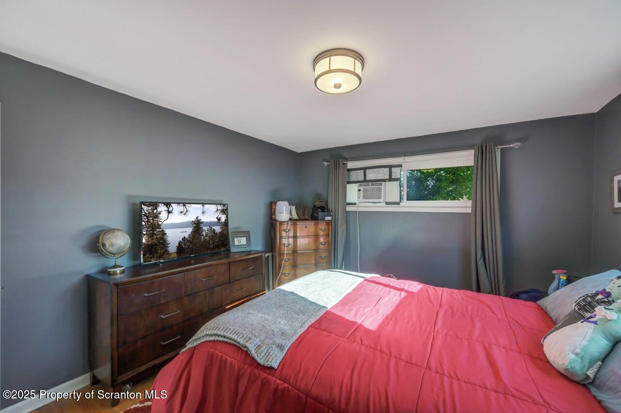 151 Primrose Avenue Clarks Summit, PA 18411 - Photo 25 of 58 a bedroom with a bed and a dresser