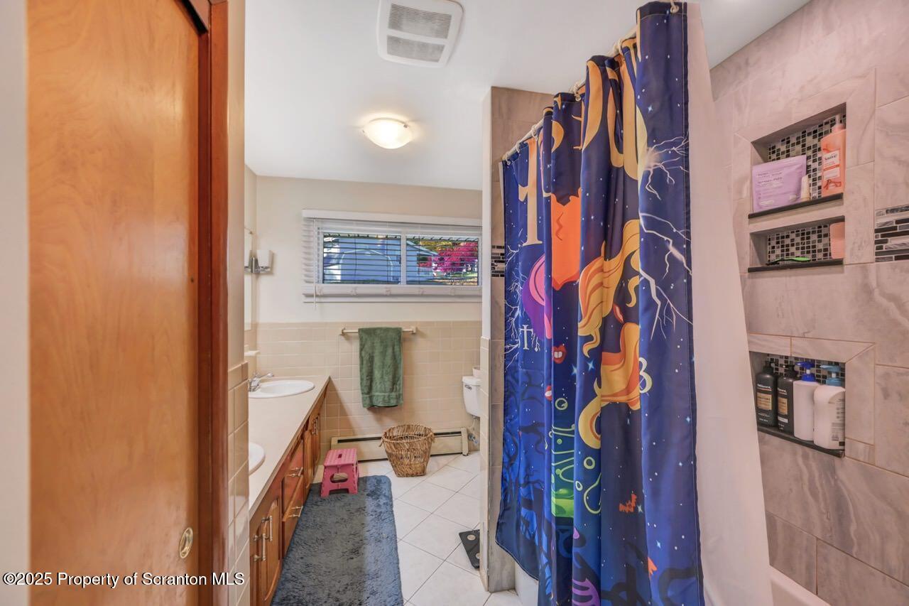 151 Primrose Avenue Clarks Summit, PA 18411 - Photo 32 of 58 a view of walk in closet with clothes