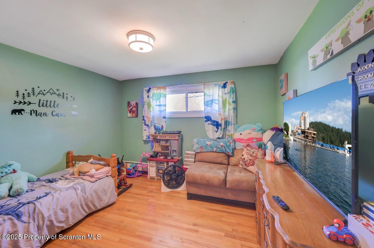 151 Primrose Avenue Clarks Summit, PA 18411 - Photo 34 of 58 a room with furniture and a flat screen tv