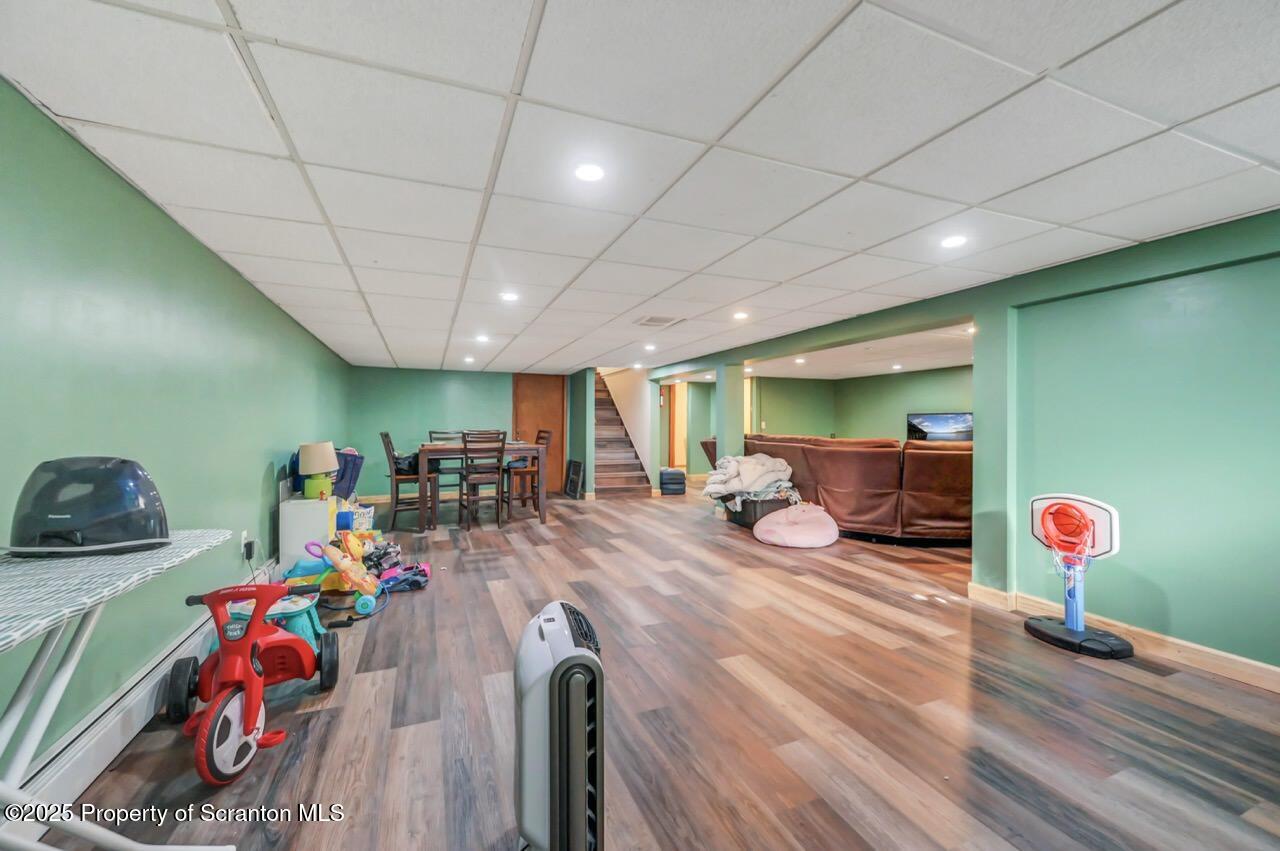 151 Primrose Avenue Clarks Summit, PA 18411 - Photo 39 of 58 a view of a room with furniture and a chandelier