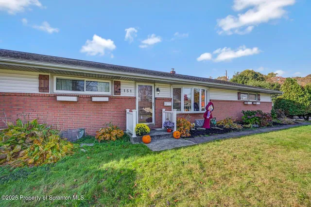 a front view of house with yard