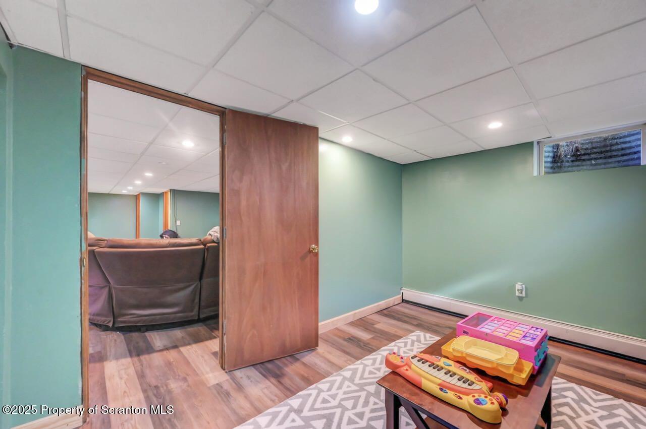 151 Primrose Avenue Clarks Summit, PA 18411 - Photo 47 of 58 a bed room with a bed and a chair