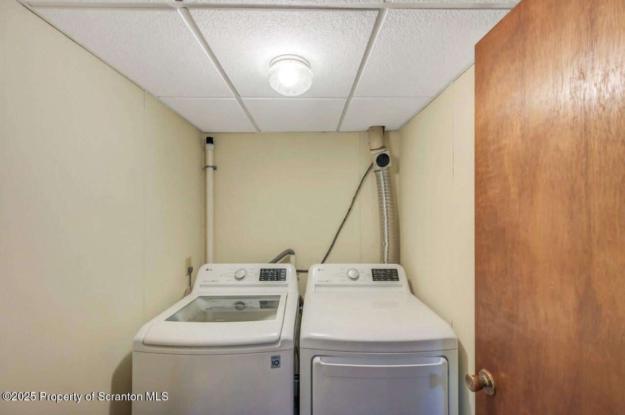 151 Primrose Avenue Clarks Summit, PA 18411 - Photo 48 of 58 a utility room with dryer and washer