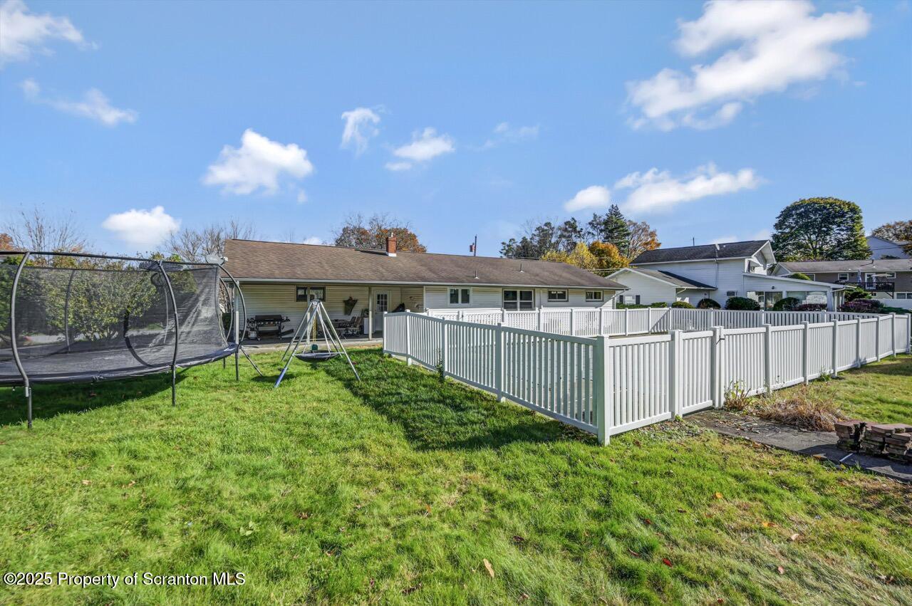 151 Primrose Avenue Clarks Summit, PA 18411 - Photo 54 of 58 a view of a house with backyard and sitting area