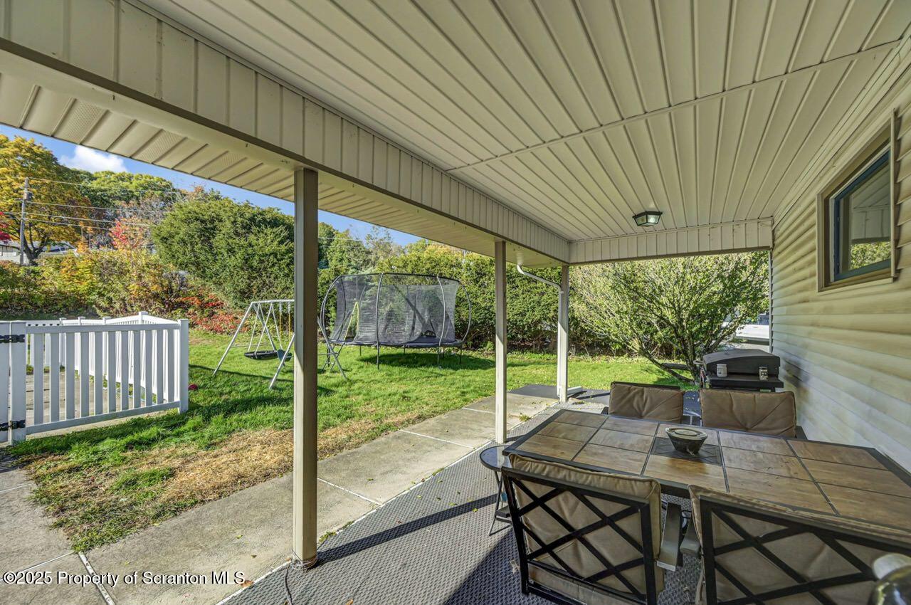 151 Primrose Avenue Clarks Summit, PA 18411 - Photo 56 of 58 a view of backyard with furniture and garden