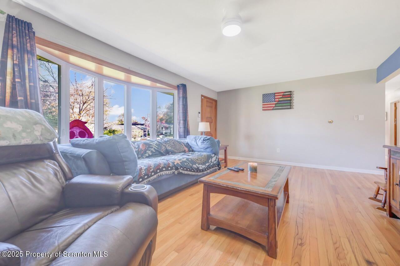 151 Primrose Avenue Clarks Summit, PA 18411 - Photo 7 of 58 a living room with furniture and a window