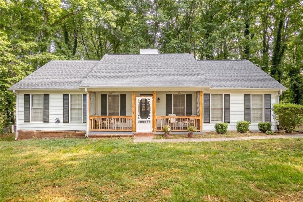 90 Hoglen Drive Covington, GA 30016 - Photo 1 of 28 a house view with sitting space and garden space