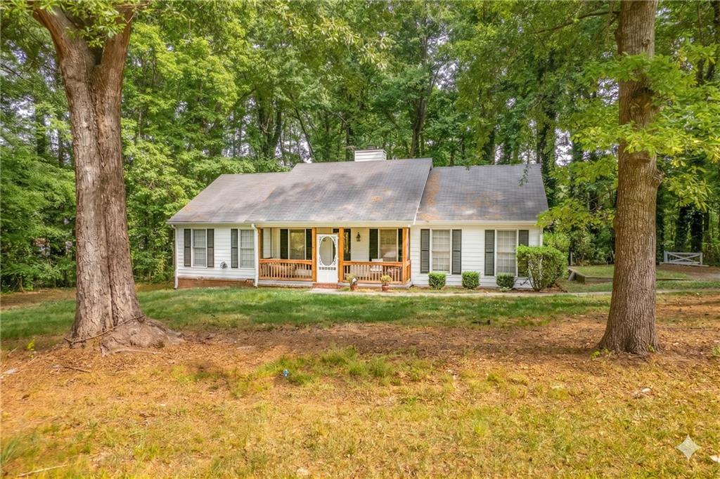 90 Hoglen Drive Covington, GA 30016 - Photo 2 of 28 a view of a house with a yard