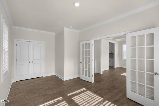 a view of entryway with wooden floor