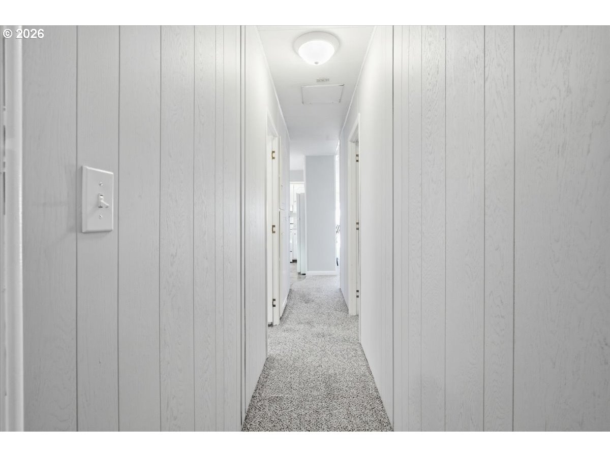 5422 Portland Road Northeast, Unit 33 Salem, OR 97305 - Photo 18 of 28 a view of a bathroom with a shower and a sink