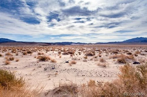 a view of an ocean from a mountain