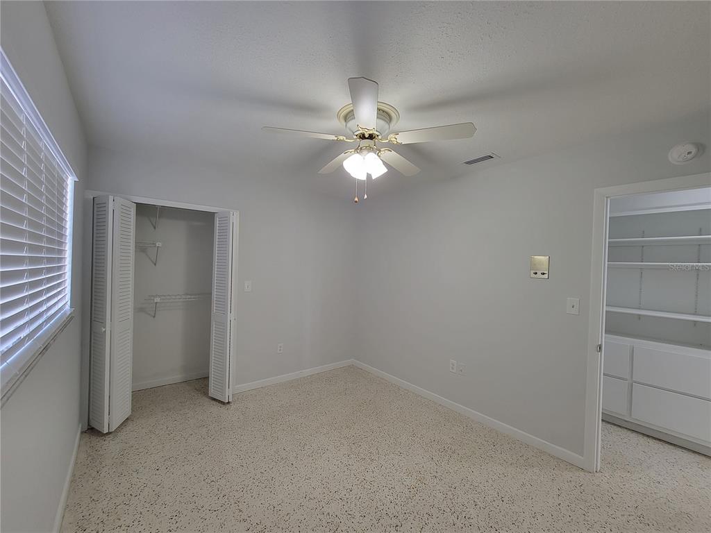 1732 Boca Raton Court Punta Gorda, FL 33950 - Photo 57 of 64 wooden floor in an empty room with a window