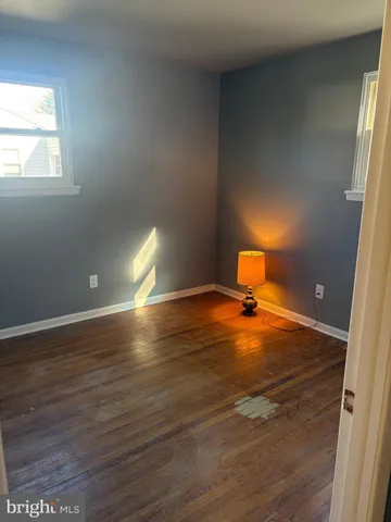 an empty room with closet area