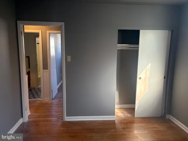 a kitchen with stainless steel appliances granite countertop a stove and a refrigerator