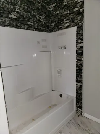 a bathroom with a bathtub