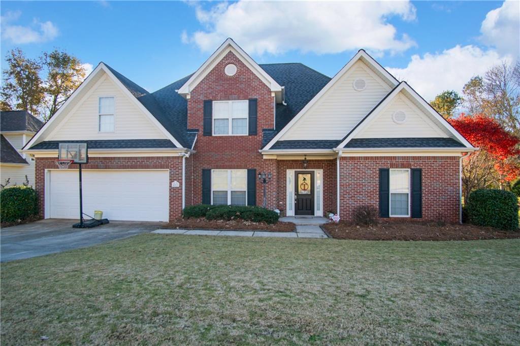 4823 Streamside Drive Flowery Branch, GA 30542 - Photo 1 of 1 front view of a house with a yard