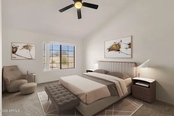 a bedroom with a bed and a couch