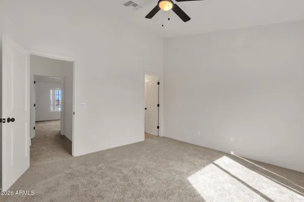 an empty room with a bathroom