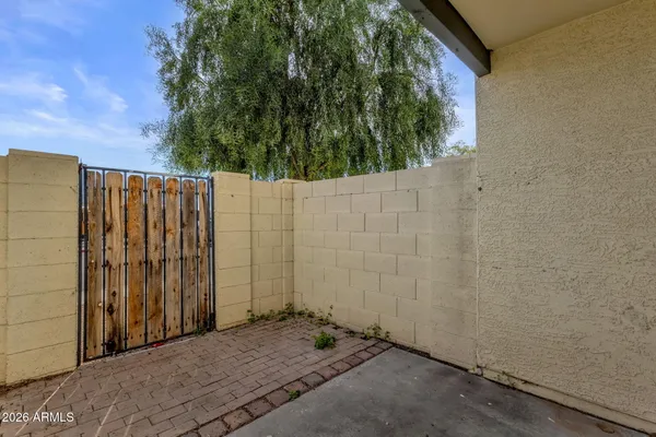 a view of a backyard of the house