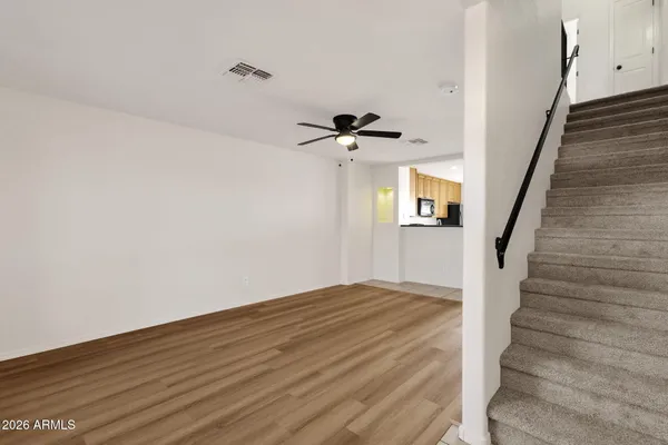 a view of entryway with wooden floor