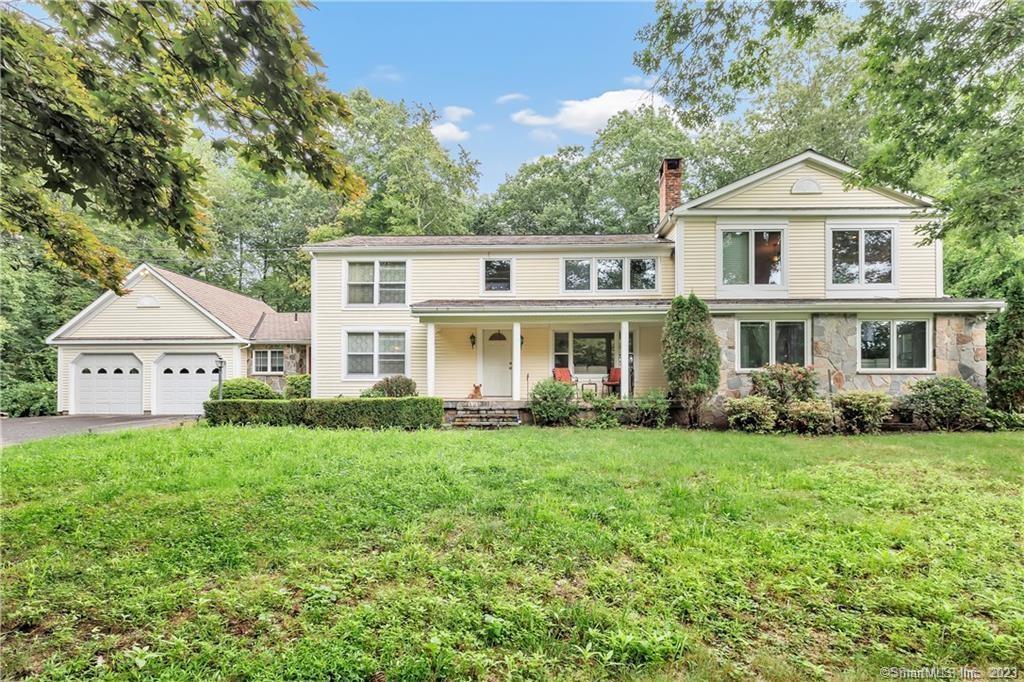 1722 Bartholomew Road Middletown, CT 06457 - Photo 1 of 1 a front view of a house with a yard and porch