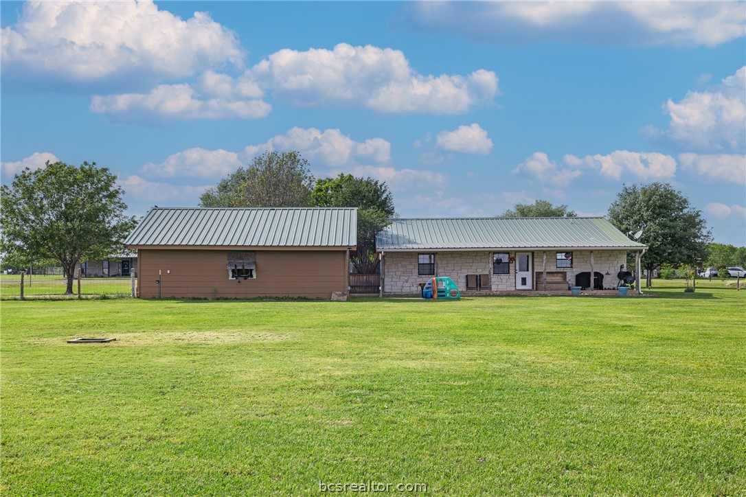 3540 Fisher Ranch Road Bryan, TX 77808 - Photo 24 of 36 a front view of house with yard and green space