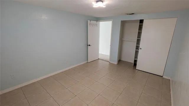 an empty room with closet