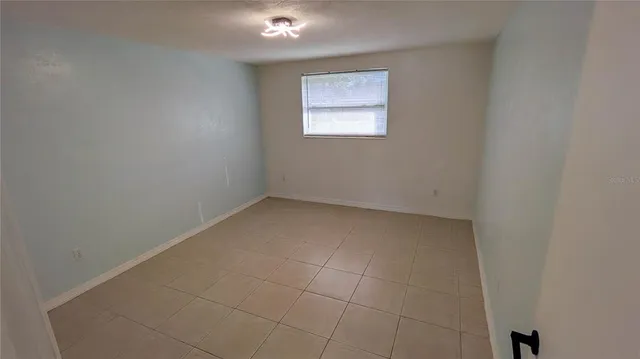 an empty room with a window