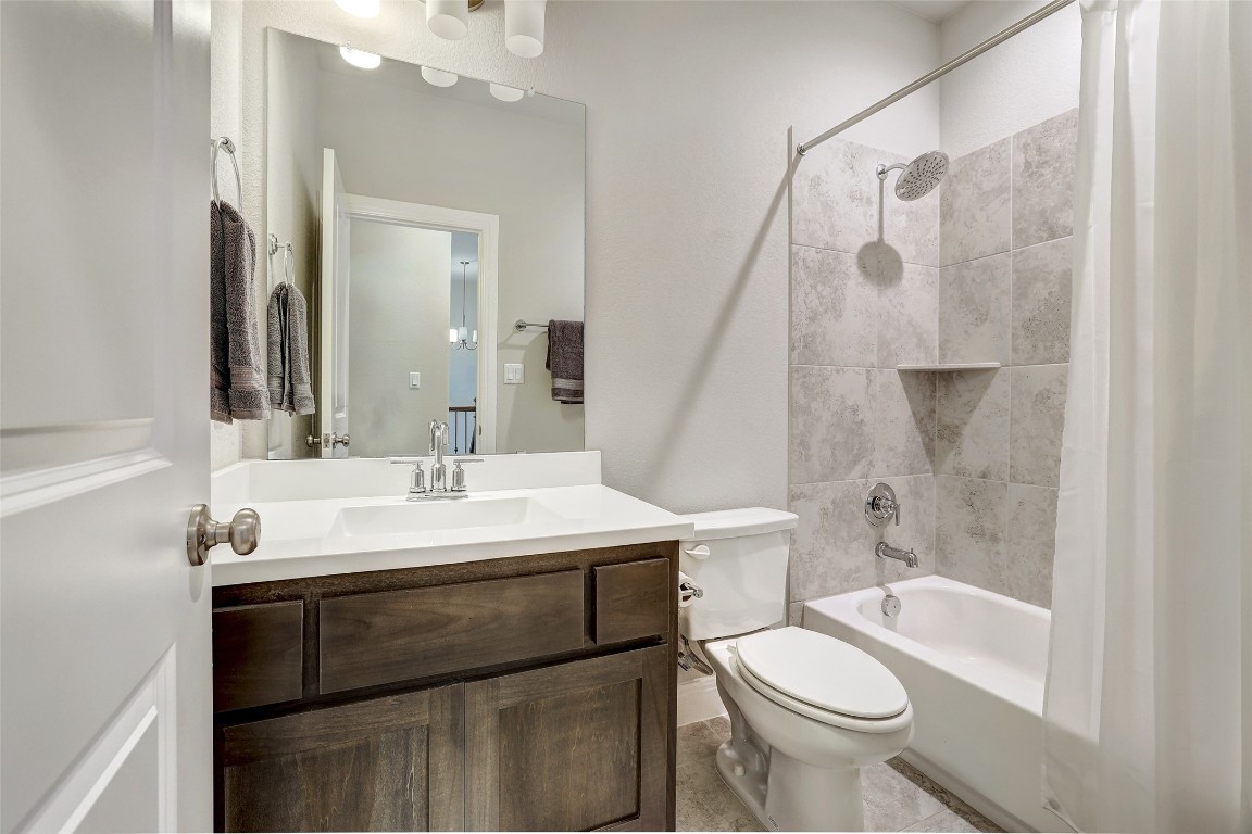 257 Axis Loop Georgetown, TX 78628 - Photo 21 of 40 a bathroom with a sink toilet and shower
