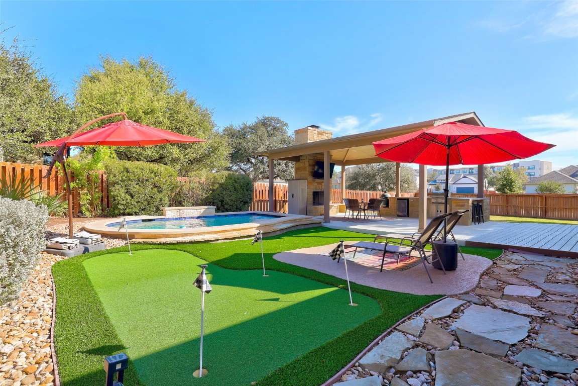 257 Axis Loop Georgetown, TX 78628 - Photo 37 of 40 a view of a swimming pool with a patio