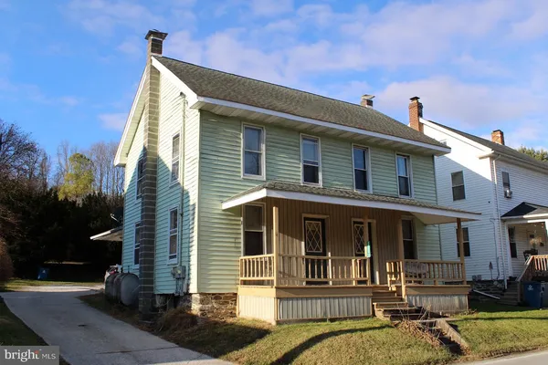 a view of a house with a patio