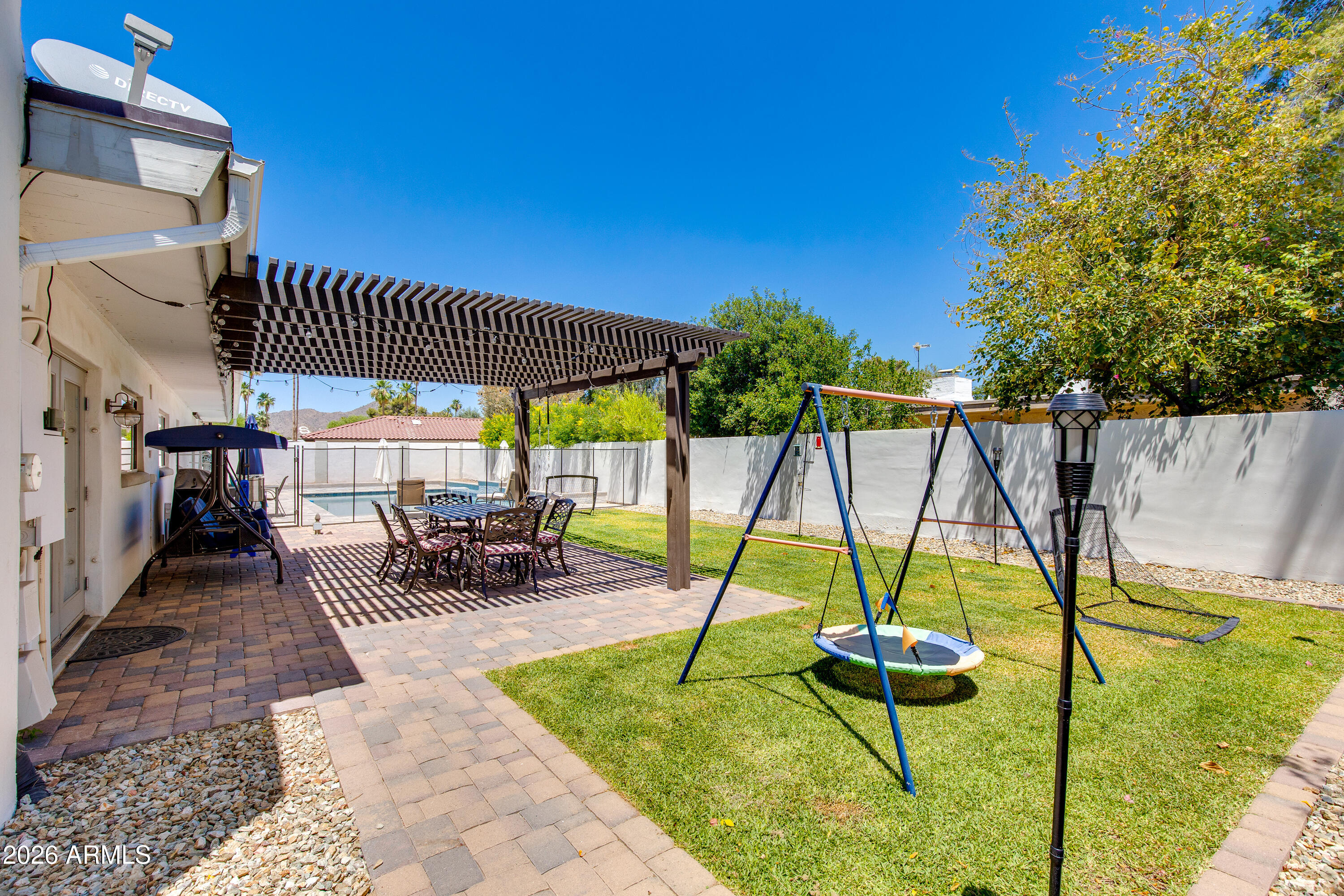 8219 North 3rd Avenue Phoenix, AZ 85021 - Photo 43 of 52 a view of a backyard with swimming pool and sitting area