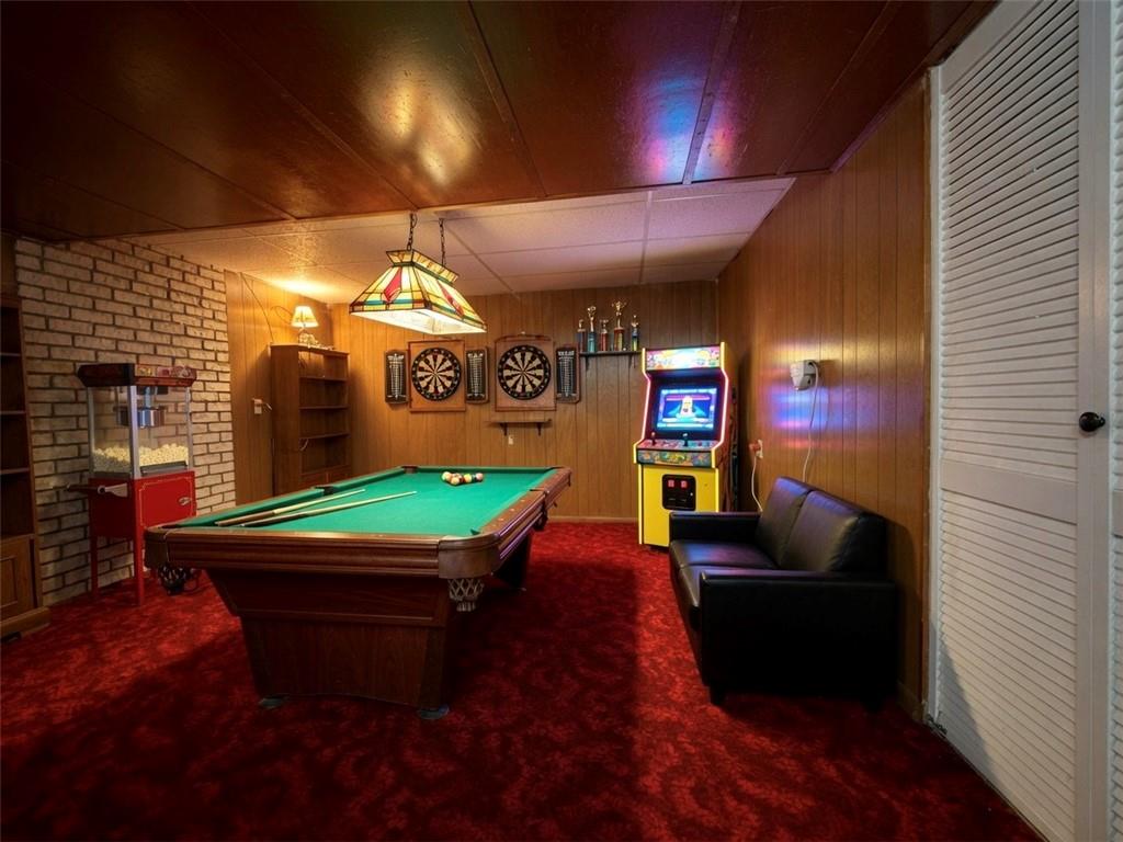 121 Kemar Drive Butler, PA 16002 - Photo 21 of 31 a room with furniture and a projector