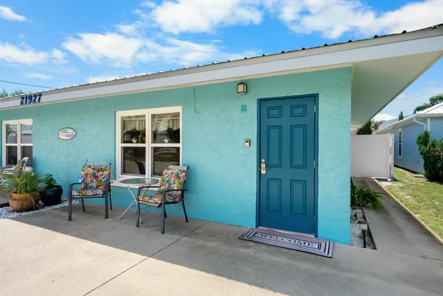 a kitchen with stainless steel appliances a stove refrigerator sink and cabinets