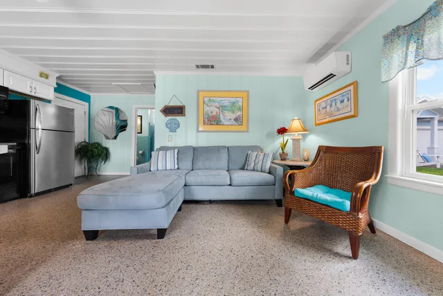a kitchen with a sink cabinets and stainless steel appliances
