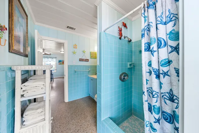 a view of storage and utility room with washer and dryer