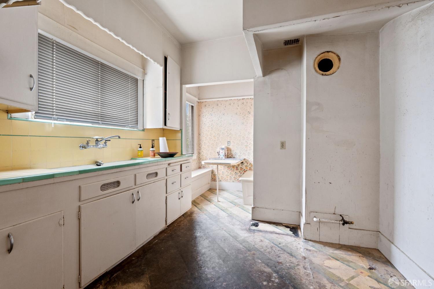 1849 Cedar Street Berkeley, CA 94703 - Photo 11 of 65 a bathroom with a sink a mirror and a bathtub