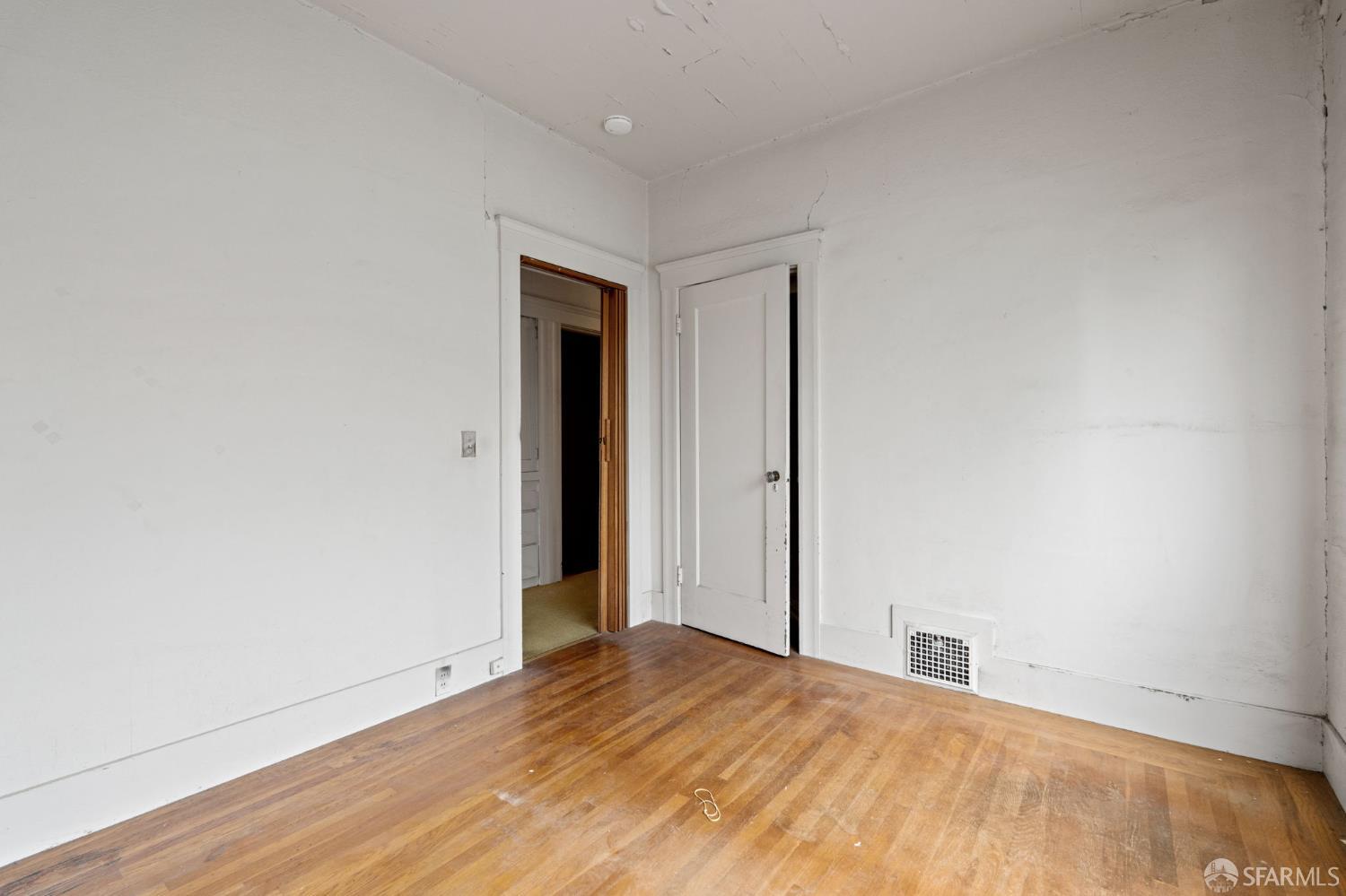1849 Cedar Street Berkeley, CA 94703 - Photo 16 of 65 a view of empty room with wooden floor