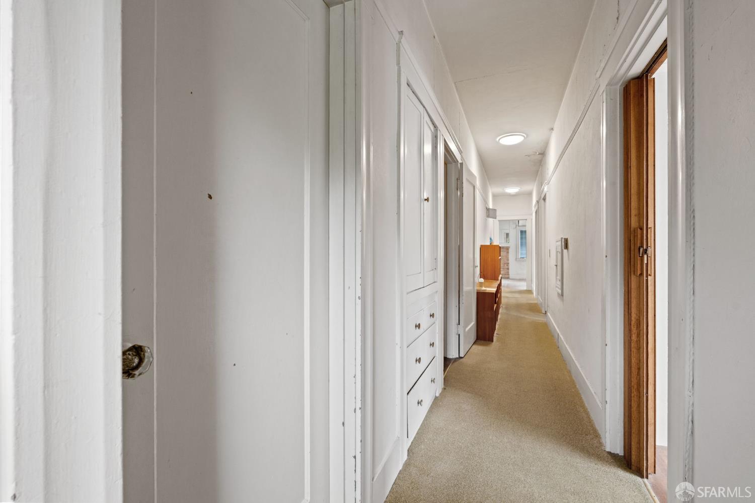 1849 Cedar Street Berkeley, CA 94703 - Photo 19 of 65 a view of a hallway with wooden floor