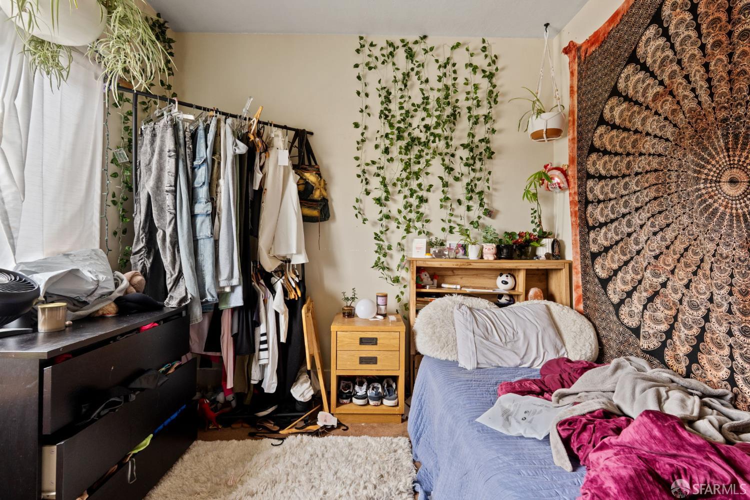 1849 Cedar Street Berkeley, CA 94703 - Photo 21 of 65 a view of walk in closet with clothes