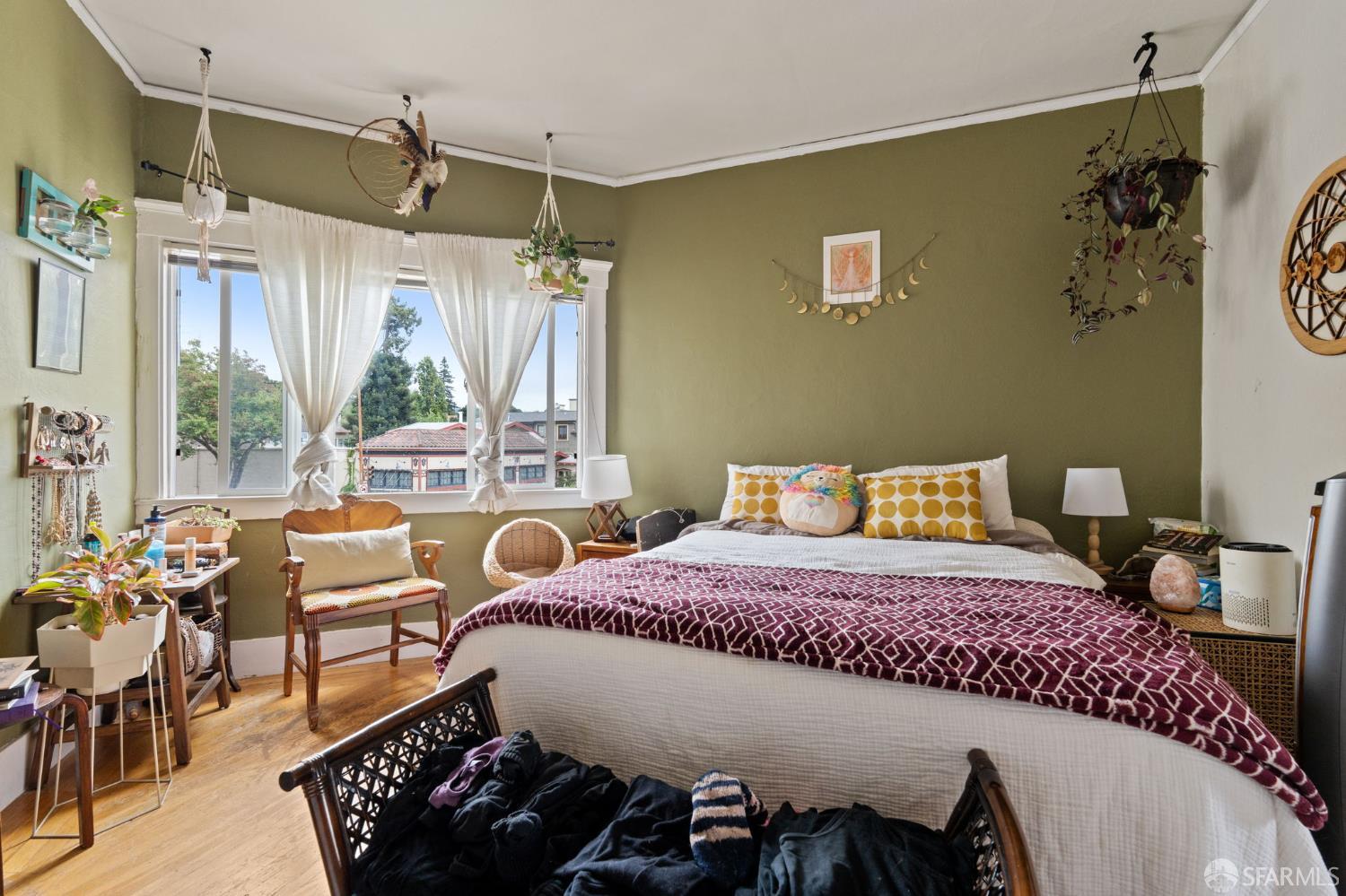 1849 Cedar Street Berkeley, CA 94703 - Photo 26 of 65 a bedroom with a bed and wooden floor