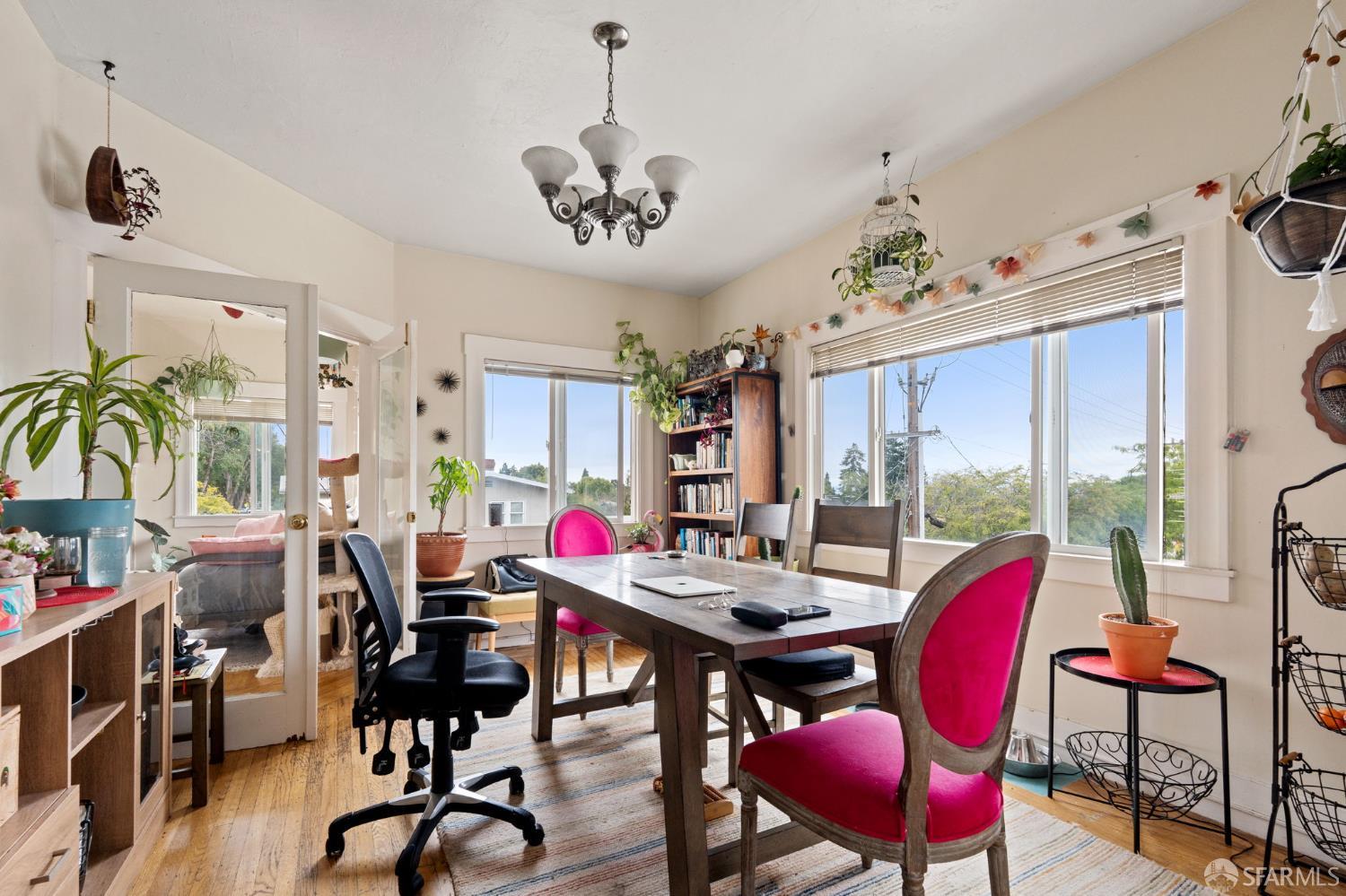 1849 Cedar Street Berkeley, CA 94703 - Photo 28 of 65 a view of a dining room with furniture window and wooden floor