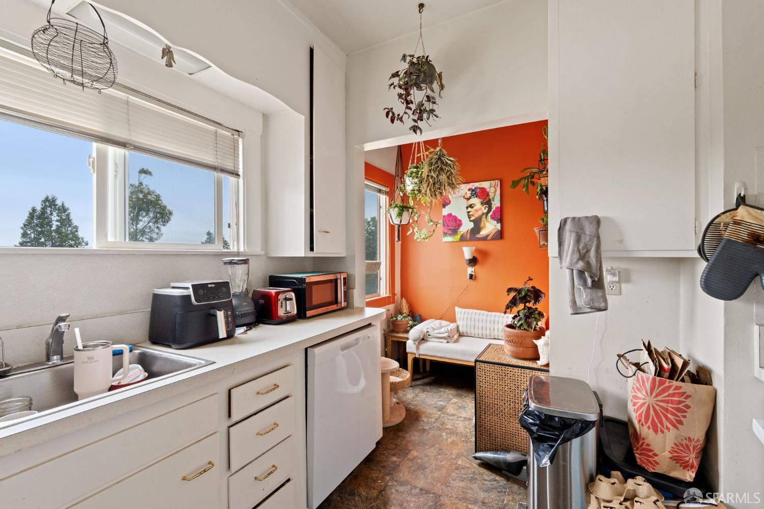 1849 Cedar Street Berkeley, CA 94703 - Photo 30 of 65 a bathroom with a sink mirror and toilet