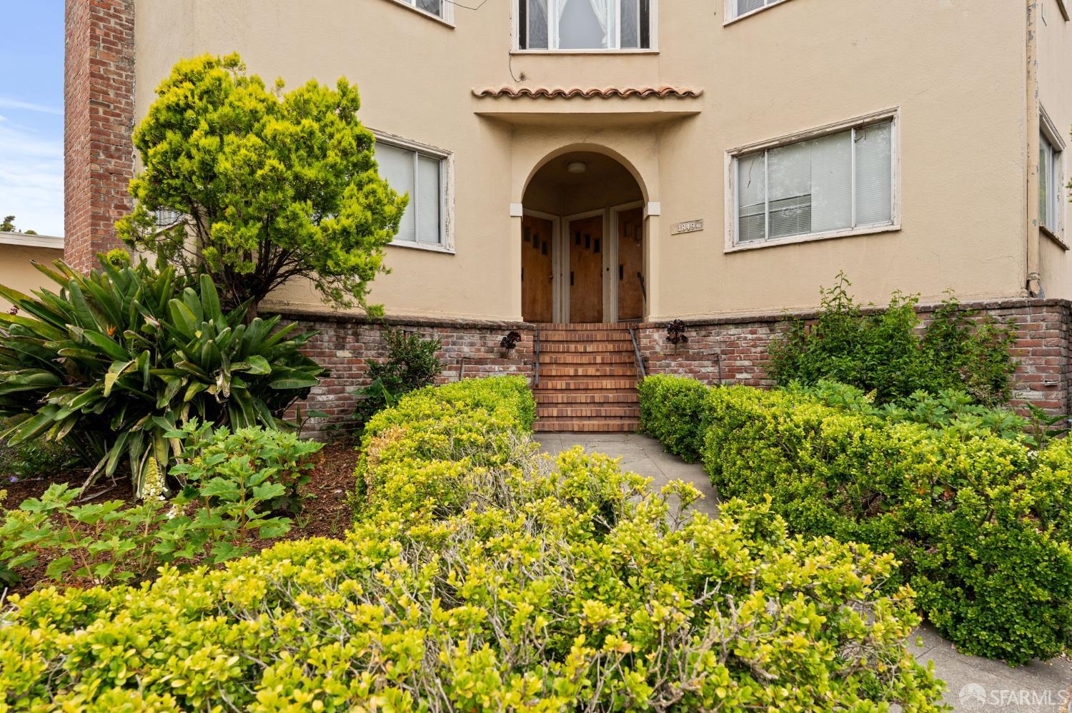 1849 Cedar Street Berkeley, CA 94703 - Photo 3 of 65 a front view of a house with a yard