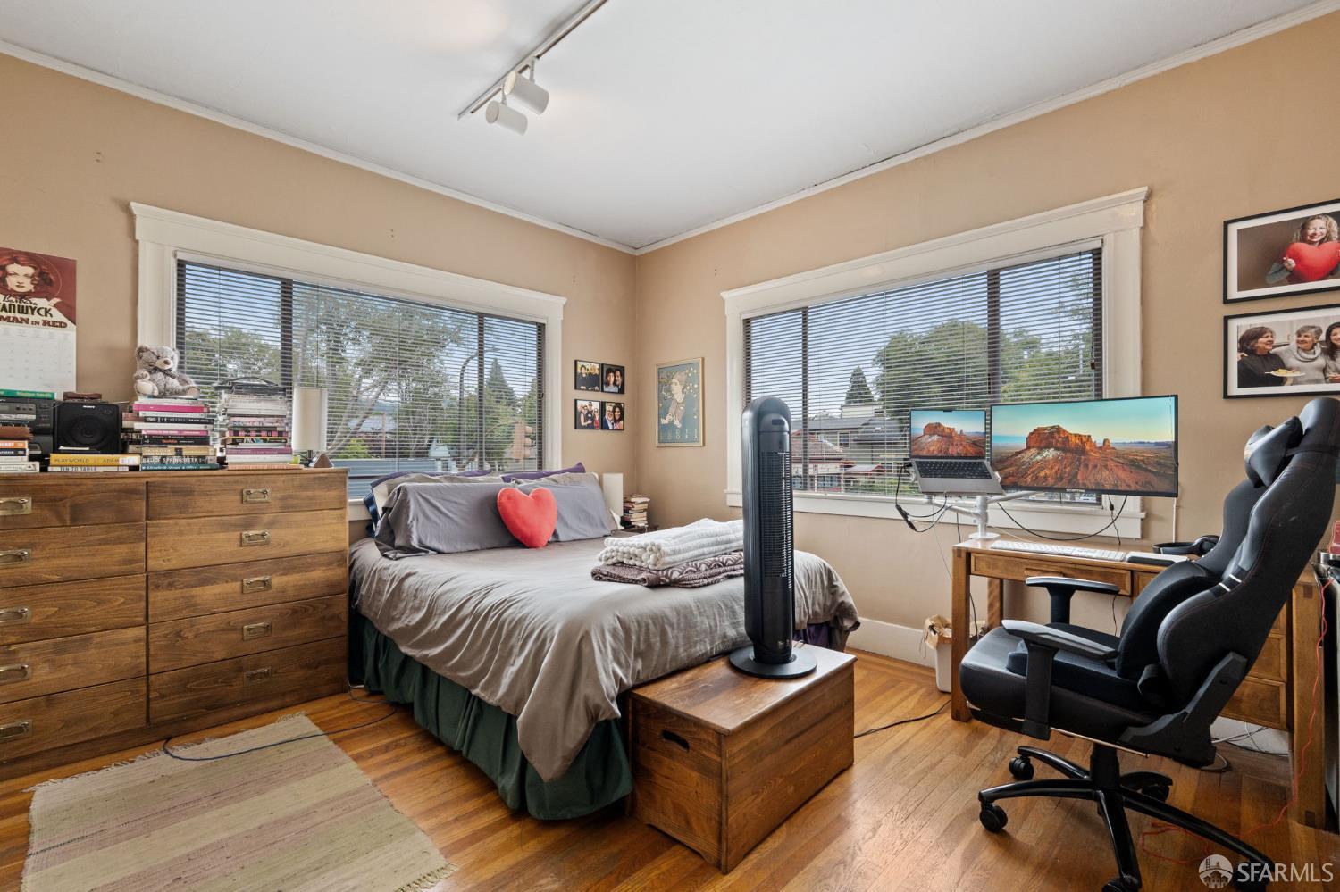 1849 Cedar Street Berkeley, CA 94703 - Photo 37 of 65 a bedroom with a bed and large windows