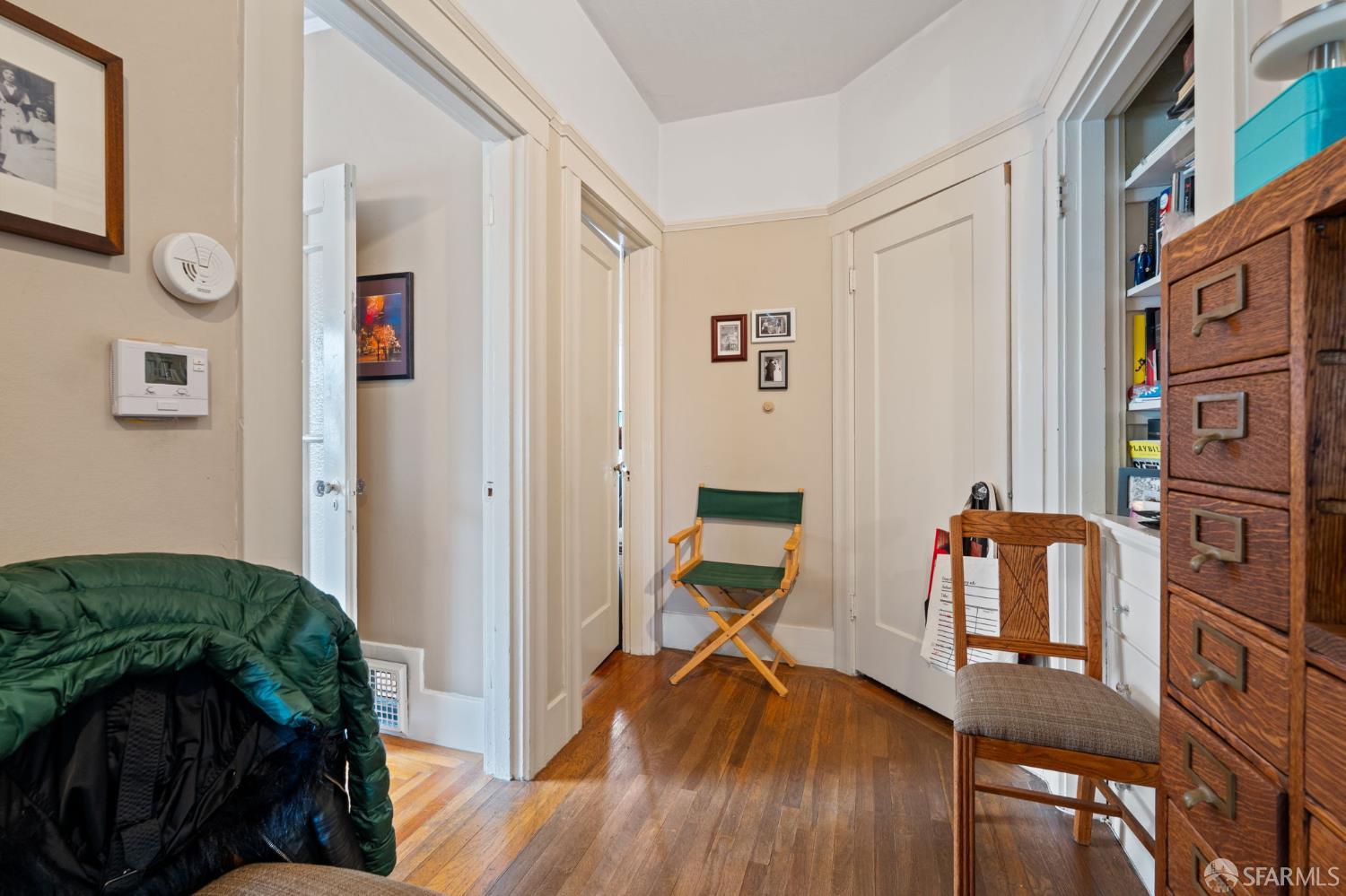 1849 Cedar Street Berkeley, CA 94703 - Photo 38 of 65 a view of a workspace with furniture and wooden floor