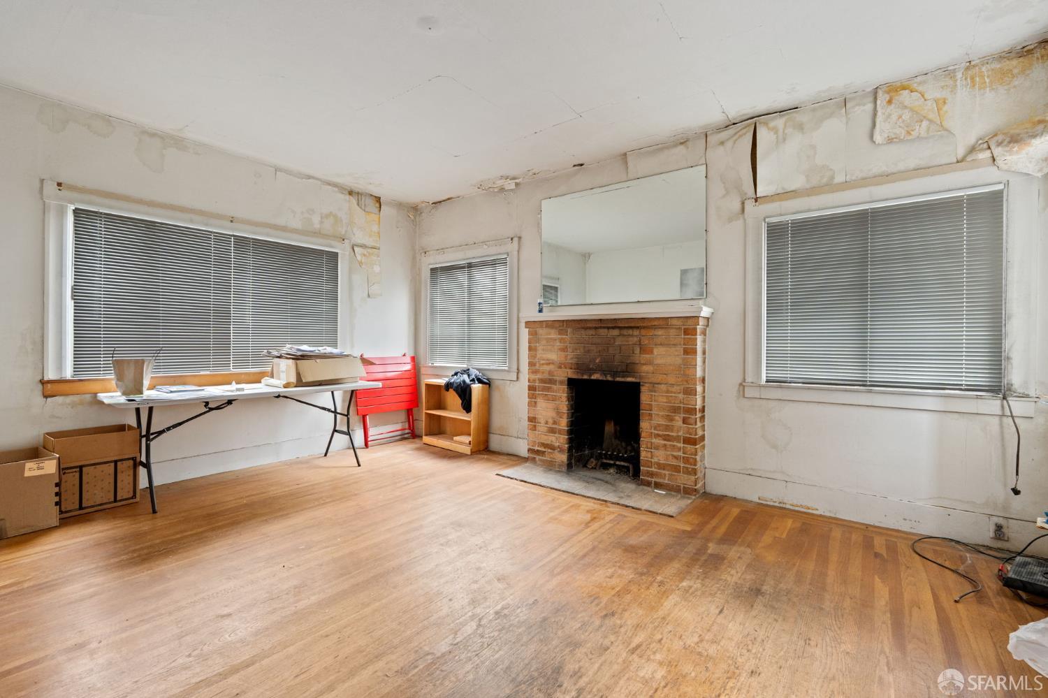 1849 Cedar Street Berkeley, CA 94703 - Photo 5 of 65 a living room with furniture and a fireplace